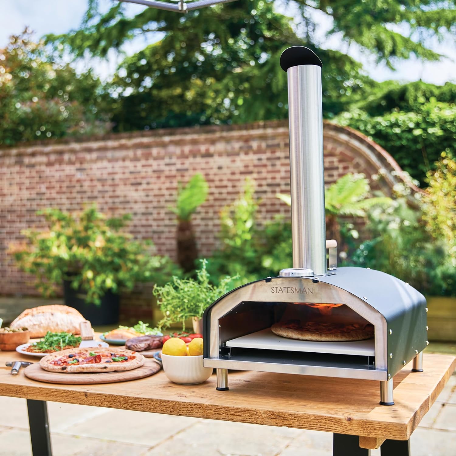 https://statesmanappliances.co.uk/cdn/shop/articles/Statesman_Wood_Fire_Oven.jpg?v=1730886725